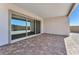 A covered patio with brick pavers provides an ideal outdoor living space at 11707 Hatchling Ave, Las Vegas, NV 89138