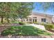 Backyard featuring artificial grass and lush landscaping at 1314 Rossini St, Henderson, NV 89052
