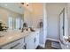 Bright bathroom vanity with solid countertop and shower-tub combination at 1314 Rossini St, Henderson, NV 89052