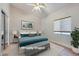 Staged bedroom features a plush bed, soft textures, and natural light for a cozy feel at 1314 Rossini St, Henderson, NV 89052