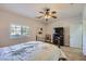 Bedroom featuring neutral walls, ceiling fan, and natural light from a window at 1314 Rossini St, Henderson, NV 89052