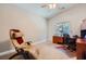 Bright room featuring natural light, comfortable chair, and office desk at 1314 Rossini St, Henderson, NV 89052