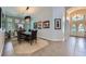 Elegant dining room featuring modern lighting and unique artwork enhancing the stylish ambiance at 1314 Rossini St, Henderson, NV 89052