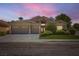 Charming single-story home featuring a well-manicured lawn and a spacious three-car garage at 1314 Rossini St, Henderson, NV 89052