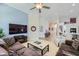 Spacious living room featuring recessed lighting, ceiling fan, and comfortable seating arrangement at 1314 Rossini St, Henderson, NV 89052
