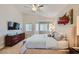 Comfortable main bedroom with soft lighting, modern decor, and ample closet space at 1314 Rossini St, Henderson, NV 89052