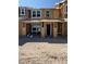 Unfinished construction of a two story home, showing the framing, windows, and entryway at 132 Silver Run Ln, Las Vegas, NV 89138