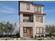 Modern three-story home showcasing contemporary design and neutral color palette at 1544 Little Penguin St, Las Vegas, NV 89138
