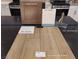 Kitchen finish samples with cabinets, paint, quartz, flooring and faucet at 1544 Little Penguin St, Las Vegas, NV 89138