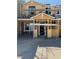 Unfinished exterior of a new two-story home with scaffolding and windows at 156 Silver Run Ln, Las Vegas, NV 89138
