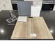 Sample kitchen design featuring luxury vinyl plank flooring, quartz countertops, and upgraded grey cabinets at 156 Silver Run Ln, Las Vegas, NV 89138