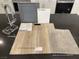 Sample kitchen design featuring luxury vinyl plank flooring, quartz countertops, and upgraded grey cabinets at 156 Silver Run Ln, Las Vegas, NV 89138