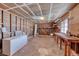 Spacious unfinished basement featuring concrete floors and exposed beams, ready for customization at 1721 E Oakey Blvd, Las Vegas, NV 89104