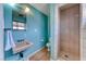Cozy bathroom featuring a standing shower and classic fixtures at 1721 E Oakey Blvd, Las Vegas, NV 89104