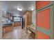 Well-lit kitchen features custom cabinets, stainless steel appliances, and a dedicated workspace for modern convenience at 1721 E Oakey Blvd, Las Vegas, NV 89104