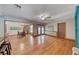 Spacious living area with hardwood floors flowing into the adjacent dining room, creating an open and inviting atmosphere at 1721 E Oakey Blvd, Las Vegas, NV 89104
