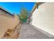 This side yard features plenty of room for additional storage and access to the back at 1721 E Oakey Blvd, Las Vegas, NV 89104
