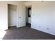 Cozy bedroom with closet space and laundry area access, providing convenience and comfort at 2044 Mesquite Ln # 301, Laughlin, NV 89029