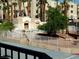 Enjoy the community pool area surrounded by palm trees at 2044 Mesquite Ln # 301, Laughlin, NV 89029