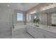 Bright bathroom with double sinks, large tub and a shower at 2246 Bird Of Prey St, Las Vegas, NV 89138