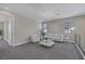 Spacious loft with comfortable seating, ample natural light, and a stylish decor at 2246 Bird Of Prey St, Las Vegas, NV 89138