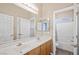 Bathroom with dual sinks and shower at 245 Homesteader Ct, Henderson, NV 89052