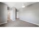Gray bedroom with neutral carpeting and ample space at 245 Homesteader Ct, Henderson, NV 89052
