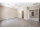 Spacious bedroom with carpet, a ceiling fan, and convenient access to adjacent rooms at 245 Homesteader Ct, Henderson, NV 89052