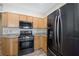 Modern kitchen featuring stainless steel appliances and ample cabinet space at 245 Homesteader Ct, Henderson, NV 89052