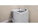Modern laundry room equipped with updated washer and dryer at 245 Homesteader Ct, Henderson, NV 89052