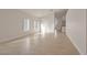 Bright living room featuring tile floors and a neutral color palette at 2455 Silver Blossom Ln, Henderson, NV 89052