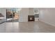 Cozy living space with a fireplace and sliding glass doors to the backyard at 2455 Silver Blossom Ln, Henderson, NV 89052