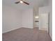Spacious primary bedroom with neutral carpet and an en-suite bathroom at 2455 Silver Blossom Ln, Henderson, NV 89052