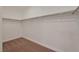 A functional walk-in closet offers ample storage with rods against the perimeter at 2455 Silver Blossom Ln, Henderson, NV 89052