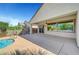 Covered patio area overlooking the pool and backyard at 2520 Eclipsing Stars Dr, Henderson, NV 89044