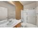 Bathroom featuring a sink and shower-tub combo with sliding glass doors at 2520 Eclipsing Stars Dr, Henderson, NV 89044