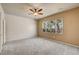 Large bedroom with ceiling fan and natural light from window at 2520 Eclipsing Stars Dr, Henderson, NV 89044