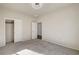 Bedroom featuring neutral carpet and access to a nearby bathroom and walk-in closet at 2520 Eclipsing Stars Dr, Henderson, NV 89044