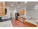 Open kitchen with stainless-steel appliances and granite countertops at 2520 Eclipsing Stars Dr, Henderson, NV 89044