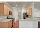 Well-equipped kitchen features wood cabinets and stainless-steel appliances at 2520 Eclipsing Stars Dr, Henderson, NV 89044