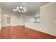 Bright living room featuring hardwood floors, recessed lighting, and a modern chandelier fixture at 2520 Eclipsing Stars Dr, Henderson, NV 89044