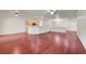 Open-concept living room with hardwood floors, a ceiling fan, and views of the adjacent kitchen at 2520 Eclipsing Stars Dr, Henderson, NV 89044