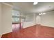 Spacious living room with hardwood floors, crown molding, and large windows offering plenty of natural light at 2520 Eclipsing Stars Dr, Henderson, NV 89044
