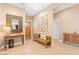 Inviting entryway with console table, bench, and decorative accents at 2799 Alnwick Ct, Henderson, NV 89044