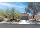Charming single-story home with desert landscaping and a two-car garage in a quiet neighborhood at 2799 Alnwick Ct, Henderson, NV 89044