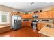 Beautiful kitchen with stainless steel appliances, granite countertops, and ample cabinet space for storage at 2799 Alnwick Ct, Henderson, NV 89044