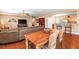 Open-concept living room with dining area, comfortable seating, and stylish decor at 2799 Alnwick Ct, Henderson, NV 89044