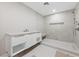 Bathroom with walk-in shower and floating vanity at 3075 Santa Margarita St, Las Vegas, NV 89146