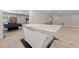 Modern island has waterfall countertop and white cabinets at 3075 Santa Margarita St, Las Vegas, NV 89146