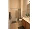 Clean bathroom featuring a shower-tub combination, single sink vanity, and neutral tile flooring at 3360 Cactus Shadow St # 203, Las Vegas, NV 89129